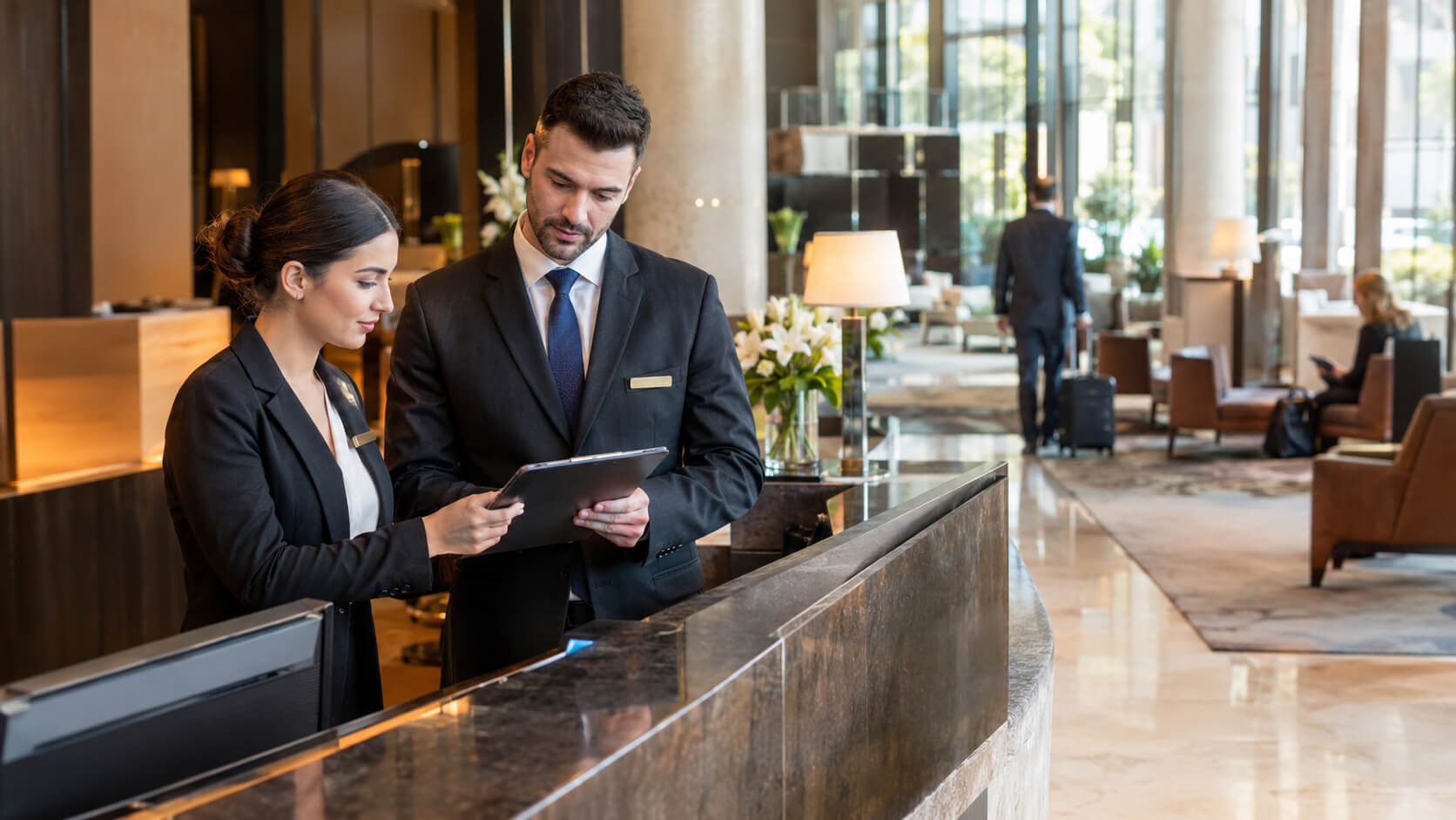 hotel management team overseeing operations